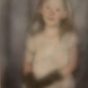 Little girl wearing black gloves