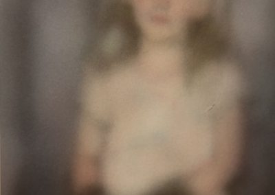 Little girl wearing black gloves