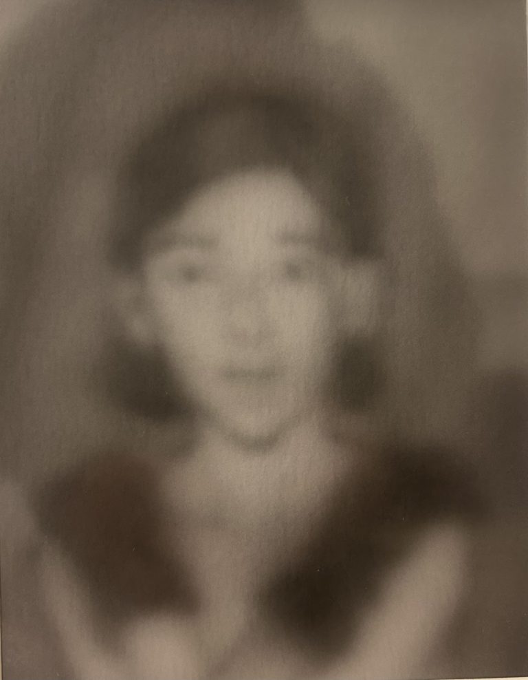 Little girl wearing black gloves