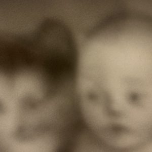 Baby and Cat fascinated by the same Ball and String